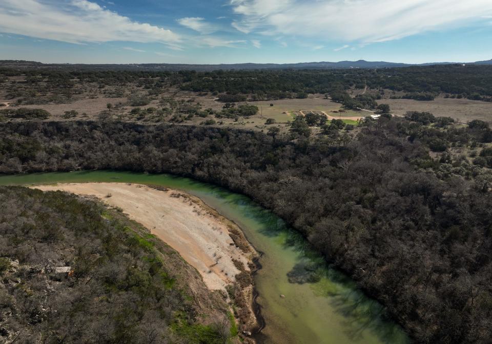 The Pedernales River flows near Roy Creek Canyon and the area planned for the Mirasol Springs development. The development’s opponents say a proposed wastewater treatment plan could threaten the river.