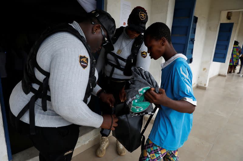 The Wider Image: Nigeria's female bouncers show their strength fighting stereotypes