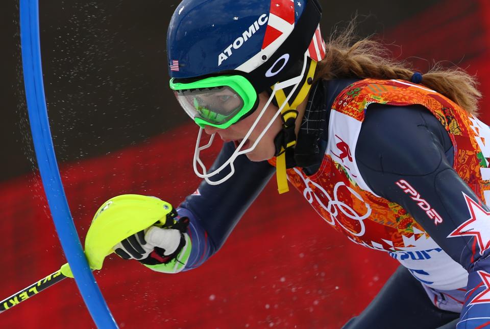 United States' Mikaela Shiffrin skis past a gate during the women's slalom at the Sochi 2014 Winter Olympics, Friday, Feb. 21, 2014, in Krasnaya Polyana, Russia. (AP Photo/Alessandro Trovati)