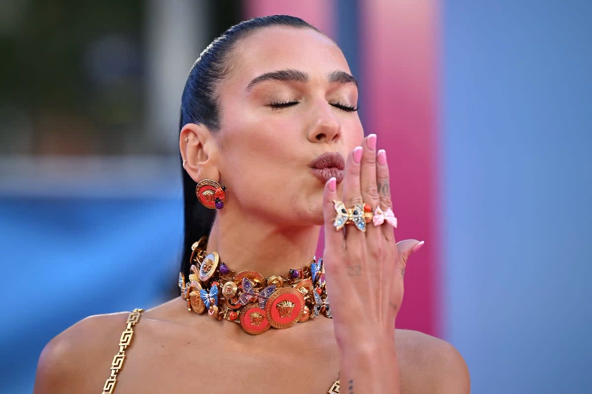 Dua Lipa who has a podcast called At Your Service  (AFP via Getty Images)