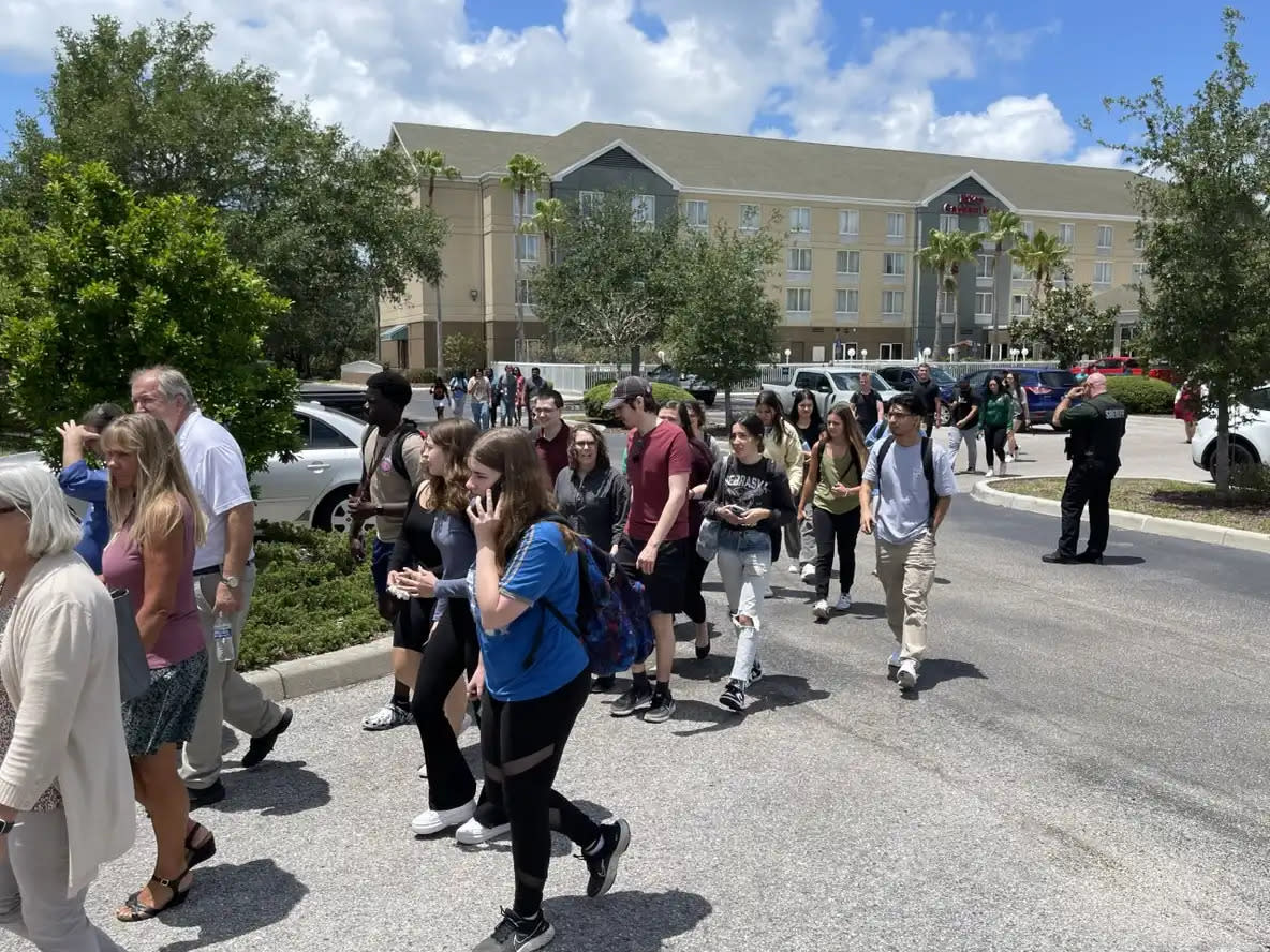 Students return to school at USF Sarasota-Manatee after a campuswide evacuation May 2. Over a dozen vehicles from the Manatee County Sheriff's Office responded to reports of shots being fired, but the incident turned out to be a hoax.