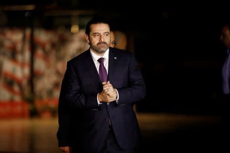 Saad al-Hariri, who announced his resignation as Lebanon's prime minister from Saudi Arabia, is seen at the grave of his father, assassinated former Lebanese prime minister Rafik al-Hariri, in downtown Beirut November 21, 2017.REUTERS/Jamal Saidi