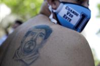 People gather to mourn the death of soccer legend Diego Armando Maradona, in Buenos Aires