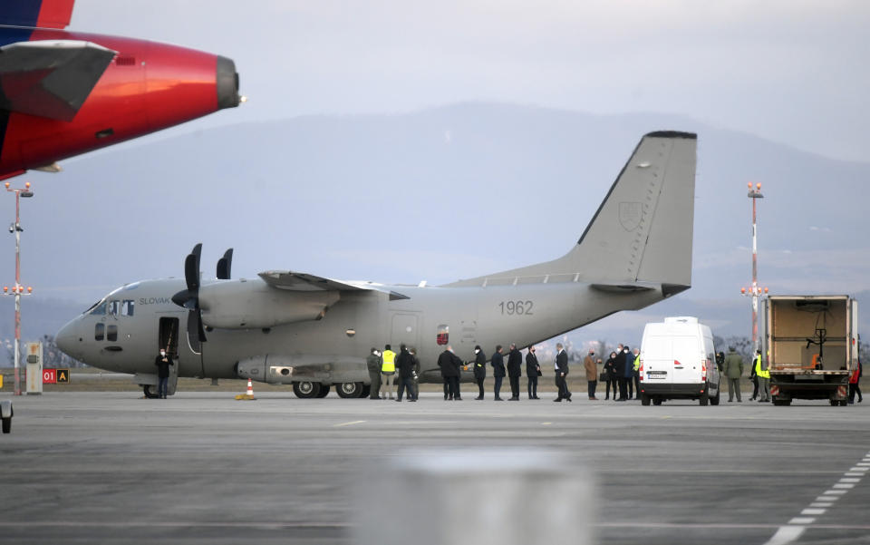 Russia's Sputnik V coronavirus vaccines arrive at Kosice Airport, Slovakia, Monday March 1, 2021. Hard-hit Slovakia signed a deal to acquire 2 million dozes of Russia’s Sputnik V coronavirus vaccine. The country's prime minister says Slovakia will get one million shots in next two months while another million will arrive in May and June. (Frantisek Ivan/TASR via AP)