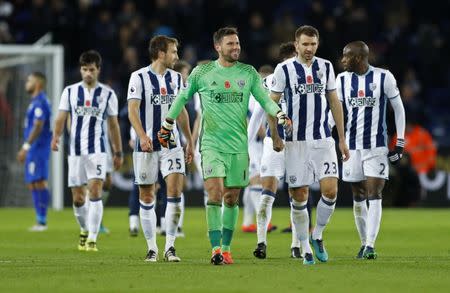 Britain Football Soccer - Leicester City v West Bromwich Albion - Premier League - King Power Stadium - 6/11/16 West Bromwich Albion's Ben Foster and Gareth McAuley celebrate after the game Action Images via Reuters / Carl Recine