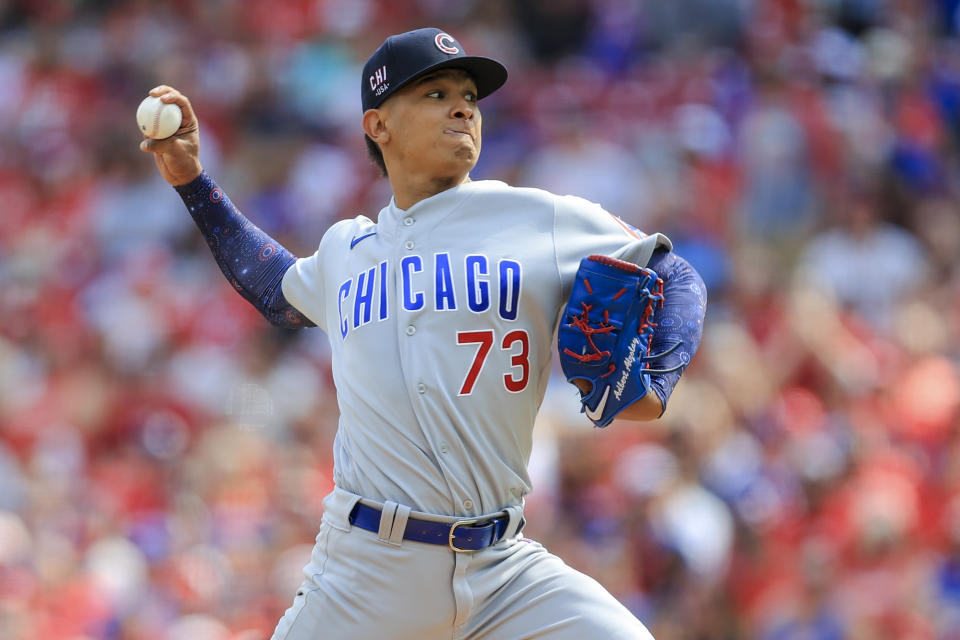 Chicago Cubs' Adbert Alzolay throws during the first inning of a baseball game against the Cincinnati Reds in Cincinnati, Saturday, July 3, 2021. (AP Photo/Aaron Doster)