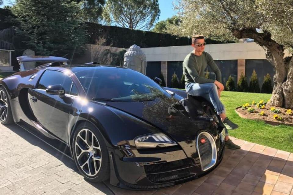 The damaged Bugatti was later taken away on a tow-truck covered in a blue tarpaulin (Ronaldo Instagram)