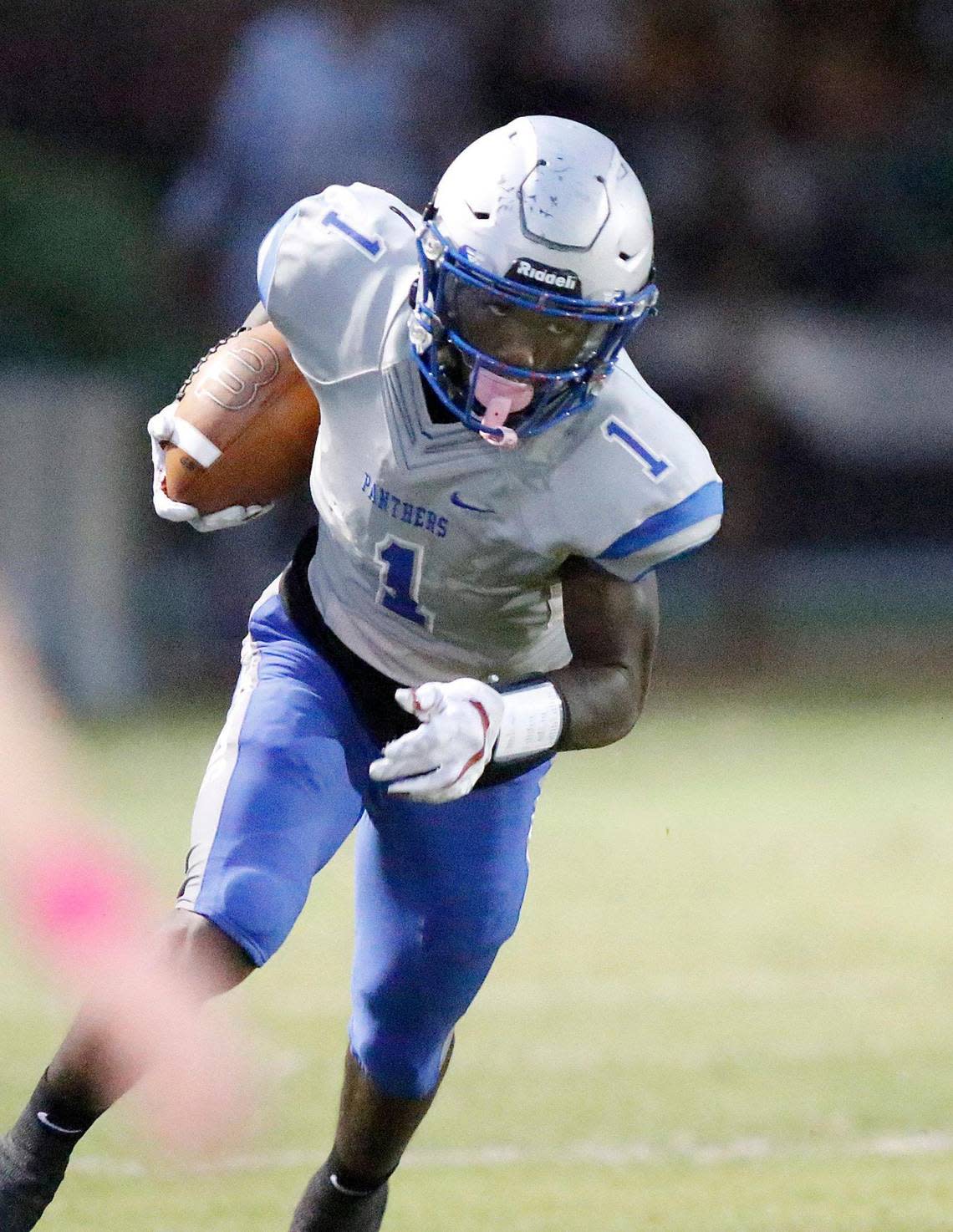 Dillard Panthers running back Christopher Johnson (1) scored three touchdowns on Friday night in their 42-6 victory over the Plantation Colonels during at PAL Football Complex in Plantation.