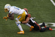 Los Angeles Chargers' Keenan Allen (13) is tackled by Cincinnati Bengals' Logan Wilson (55) during the first half of an NFL football game, Sunday, Sept. 13, 2020, in Cincinnati. (AP Photo/Darron Cummings)