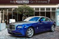 This July 2013 publicity photo provided by courtesy of Rolls-Royce Motor Cars Ltd. shows the Rolls-Royce Wraith making its public debut at Yokohama Concours D'Elegance in Yokohama, Japan. It’s the most powerful Rolls ever built, with a 6.6-liter V12 engine that gets 624 horsepower. Inside, there’s a new system that uses GPS data and navigation to scan the road ahead and automatically pick out the right gear from the eight-speed transmission. (AP Photo/Copyright Rolls-Royce Motor Cars Ltd.)