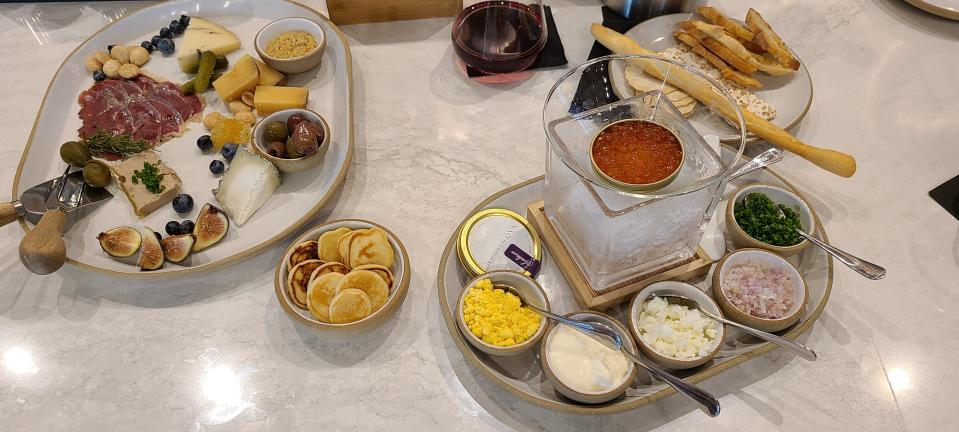 Caviar ($28), charcuterie & cheese ($54) at Rebecca's Wine Bar.