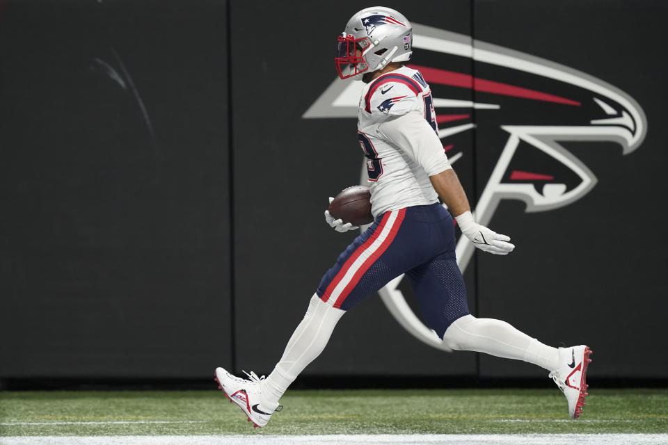 New England Patriots middle linebacker Kyle Van Noy (53) runs into the end zone after an interception for a touchdown against the Atlanta Falcons during the second half of an NFL football game, Thursday, Nov. 18, 2021, in Atlanta. The New England Patriots won 25-0. (AP Photo/Brynn Anderson)