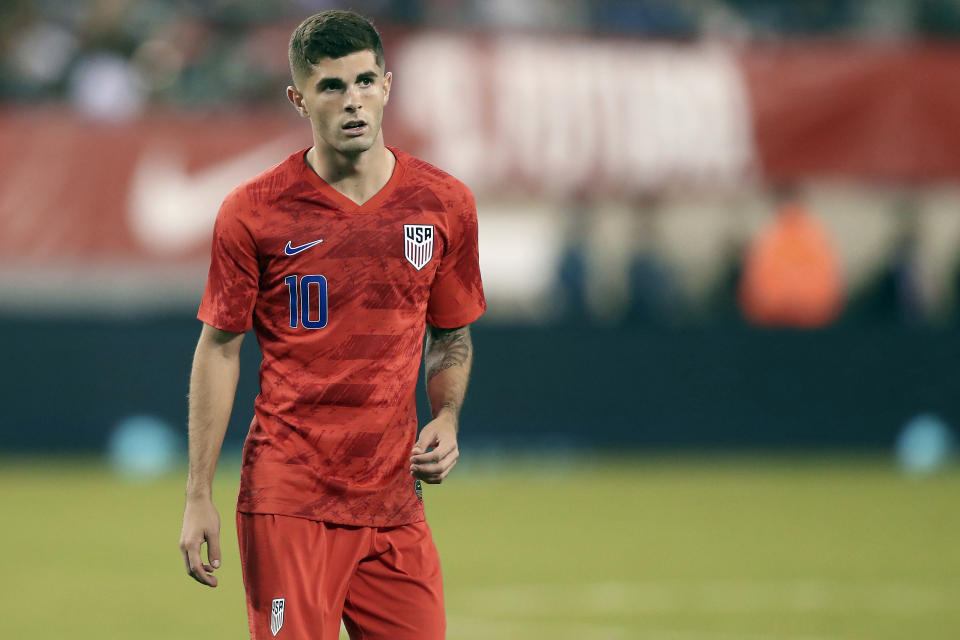 FILE - In this Sept. 6, 2019, file photo, United States midfielder Christian Pulisic pauses during an international friendly soccer match against Mexico in East Rutherford, N.J. Pulisic's availability for the United States' opening World Cup qualifier remains unclear following his positive COVID test. The top American player was on the 26-man roster announced Thursday for the first three qualifiers after missing Chelsea’s match at Arsenal last weekend. The U.S. starts at El Salvador on Sept. 2. (AP Photo/Steve Luciano, File)