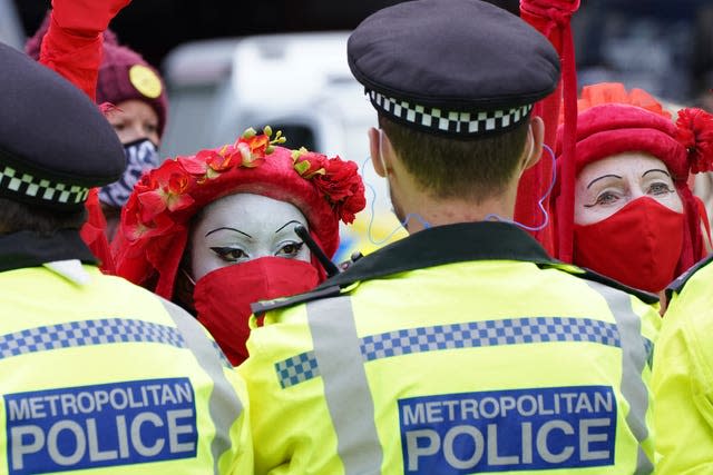 Demonstrators and police come face to face (Ian West/PA)