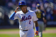 New York Mets' Omar Narvaez reacts after flying out to end the fourth inning of the team's baseball game against the Milwaukee Brewers on Sunday, March 31, 2024, in New York. (AP Photo/Frank Franklin II)