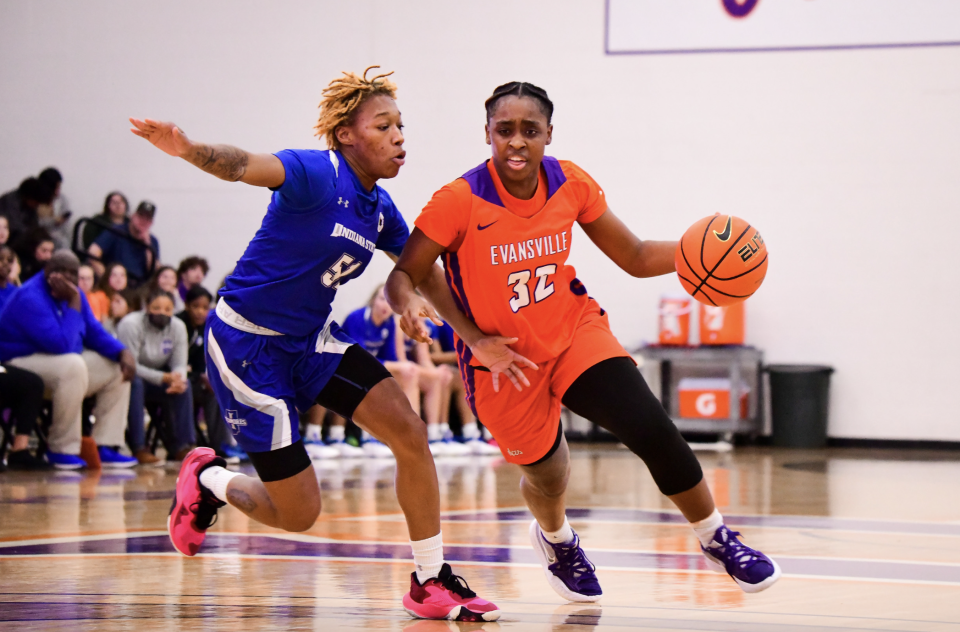 Evansville guard Myia Clark dribbles against Indiana State.