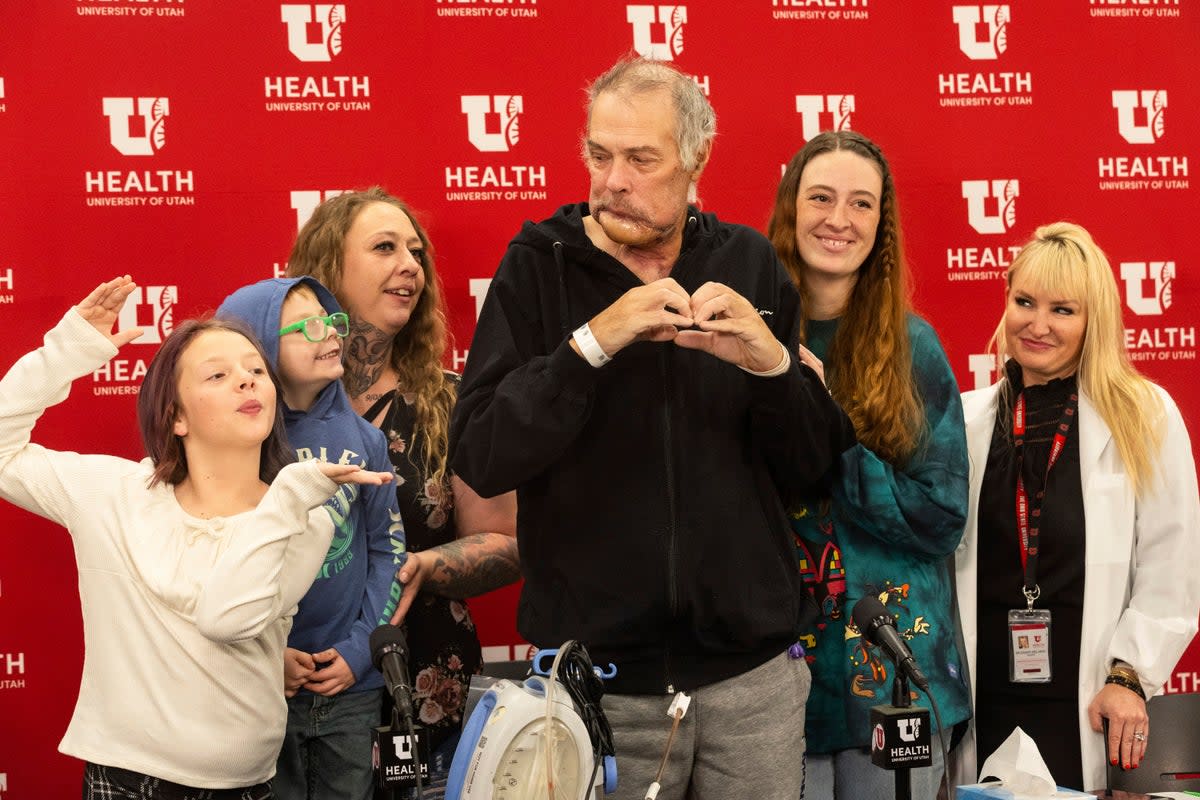 His daughters sat side by side their father, reading out statements on his behalf (Megan Nielsen/The Deseret News/AP)