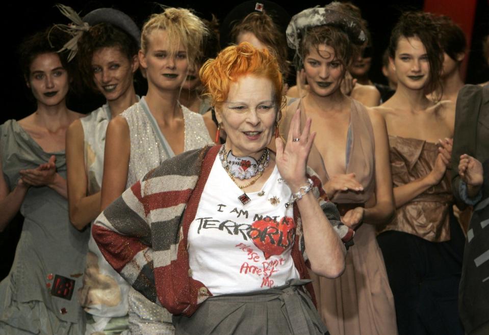 Vivienne Westwood salutes the public after the presentation of her Spring/Summer 2006 collection in Paris (AP)