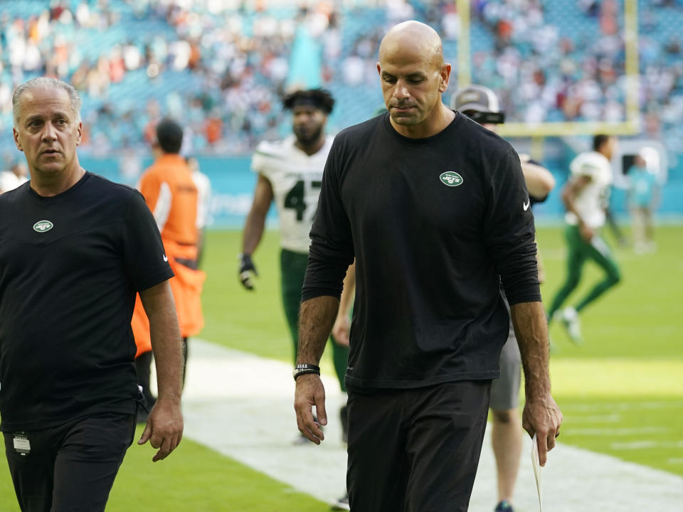 New York Jets head coach Robert Saleh leaves the field at the end of an NFL football game against the Miami Dolphins, Sunday, Dec. 19, 2021, in Miami Gardens, Fla. The Dolphins defeated the Jets 31-24. (AP Photo/Lynne Sladky)