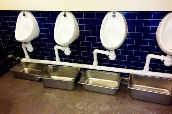 Man discovers kitchen trays being used to catch water from leaking urinals at Bristol pub