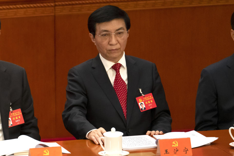 Politburo Standing Committee member Wang Huning attends the opening ceremony of the 20th National Congress of China's ruling Communist Party at the Great Hall of the People in Beijing, China, Sunday, Oct. 16, 2022. While Xi Jinping is primed to receive a third five-year term as head of China's ruling Communist Party at this week's congress, new members of the party's leading bodies are expected to be appointed at the meeting, whose proceedings are mainly held behind closed doors. (AP Photo/Mark Schiefelbein)