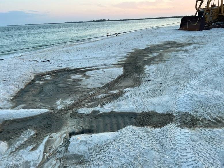 This sludge-like material is apparently oil that was spilled from heavy machinery working on a Marco Island beach.
(Photo: Audubon of the Western Everglades)