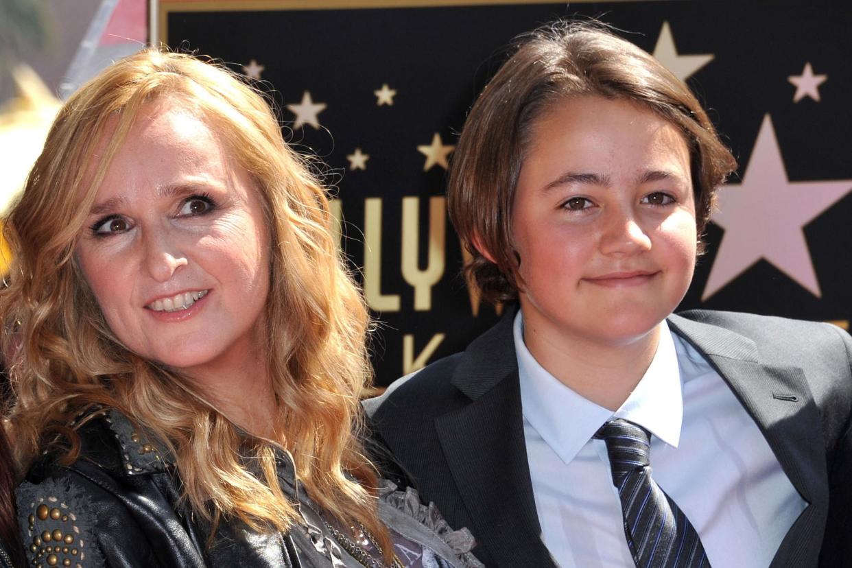 Melissa Etheridge with her son Beckett during her Walk of Fame ceremony on 27 September 2011 in Hollywood: CHRIS DELMAS/AFP via Getty Images