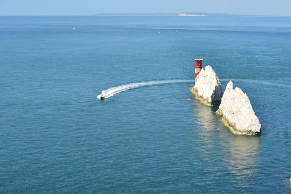 Take a high-speed rib from Alum Bay for a whistle-stop tour on the water (Getty/iStockphoto)