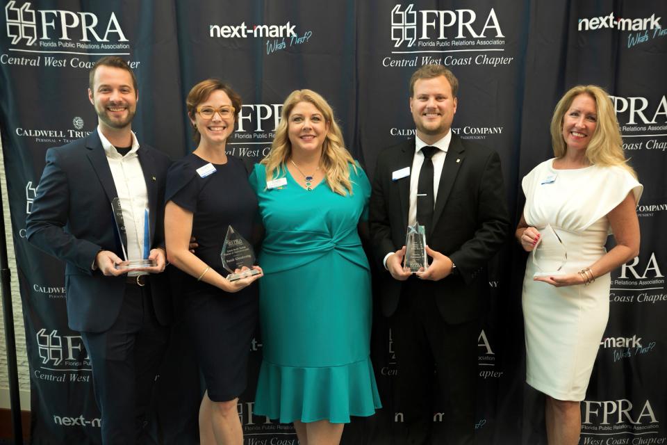 CWC-FPRA immediate past president Melanie Reda, center, with chapter members honored during the Chapter Awards & Board Installation: Hunter Carpenter, left, Sarah Glendening, Travis Cornwell and Sheryl Vieira.