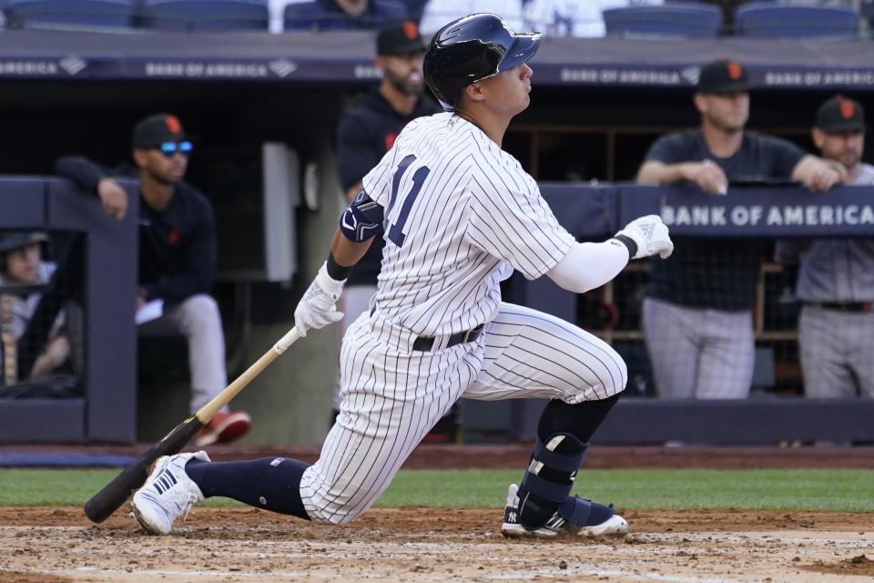 New York Yankees' Anthony Volpe follows through after hitting an RBI-single in the second inning of a baseball game against the San Francisco Giants, Saturday, April 1, 2023, in New York. (AP Photo/Mary Altaffer)