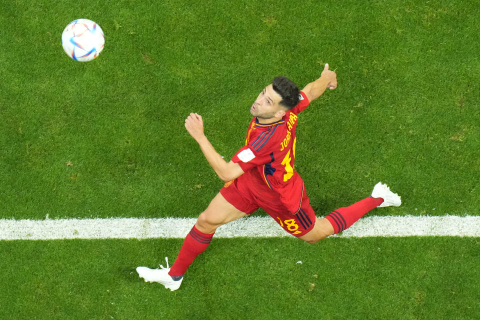 Spain's Jordi Alba eyes the ball during the World Cup group E soccer match between Spain and Germany, at the Al Bayt Stadium in Al Khor , Qatar, Sunday, Nov. 27, 2022. (AP Photo/Petr David Josek)