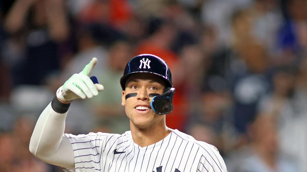 Aaron Judge #99 of the New York Yankees reacts after hitting his second home run of the game in the fifth inning against the Chicago Cubs at Yankee Stadium on June 11, 2022 in New York City. New York Yankees defeated the Chicago Cubs 8-0.