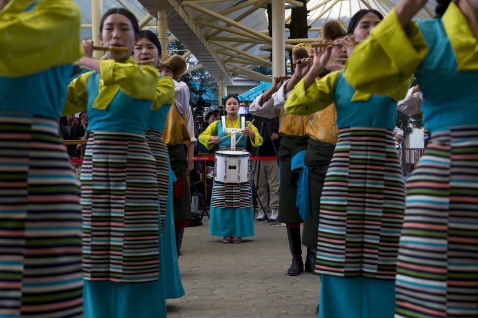 Exile Tibetan artists play their national anthem during an event marking the anniversary of the awarding of the Nobel Peace Prize to their spiritual leader the Dalai Lama in Dharamshala, India, Sunday, Dec. 10, 2023. (AP Photo/Ashwini Bhatia)