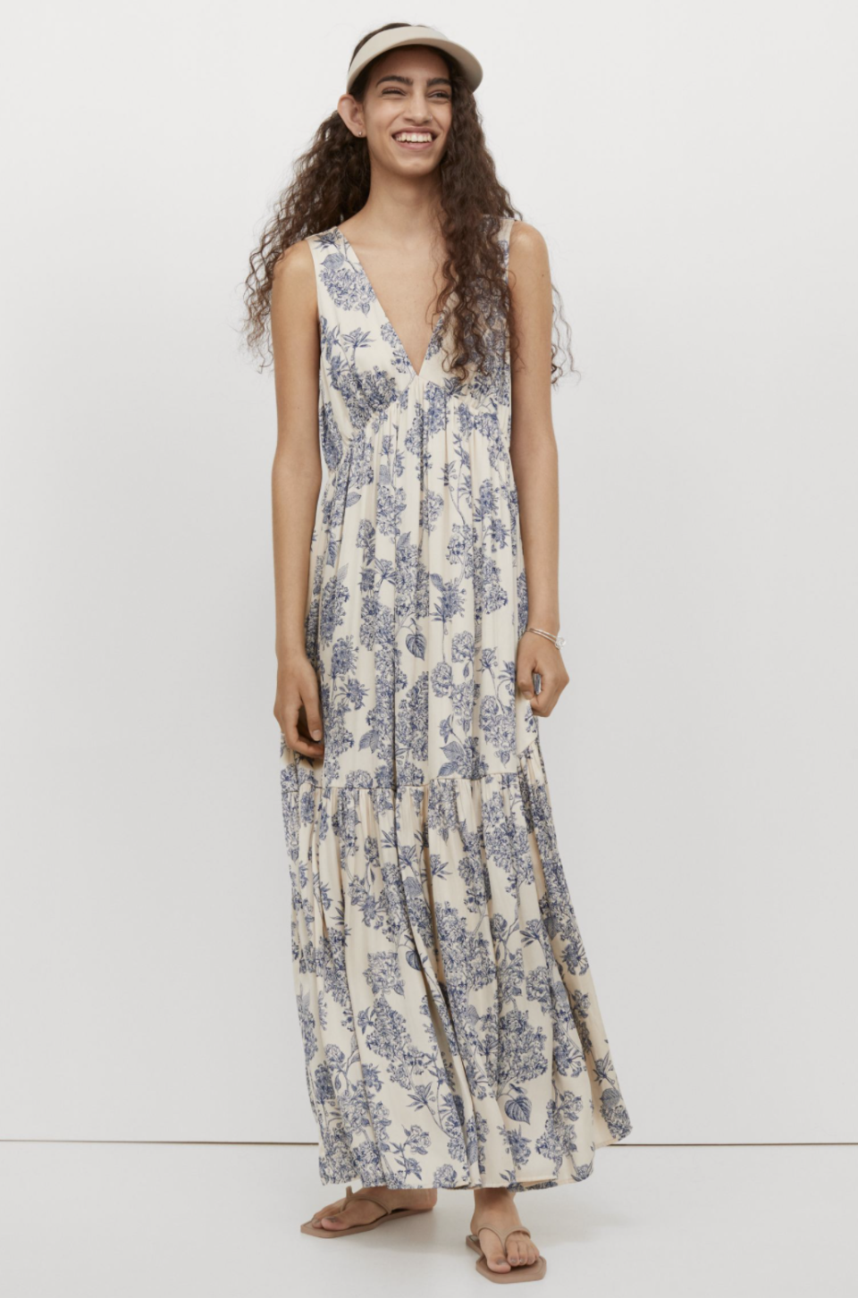 Long V-Neck Dress in Cream/Blue Floral (Photo via H&M)

