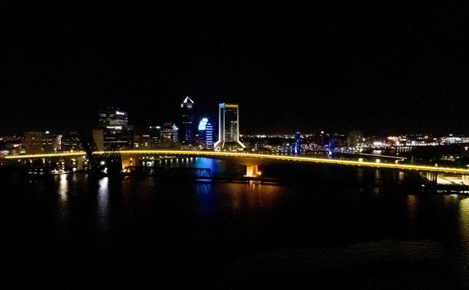 The LED lights of the Acosta Bridge glow gold in September 2020 in support of National Childhood Cancer Awareness Month, an initiative led by the Tom Coughlin Jay Fund.
