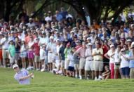 Sep 24, 2017; Atlanta, GA, USA; Justin Thomas plays his approach shot onto the 18th green during the final round of the Tour Championship golf tournament at East Lake Golf Club. Mandatory Credit: Brett Davis-USA TODAY Sports