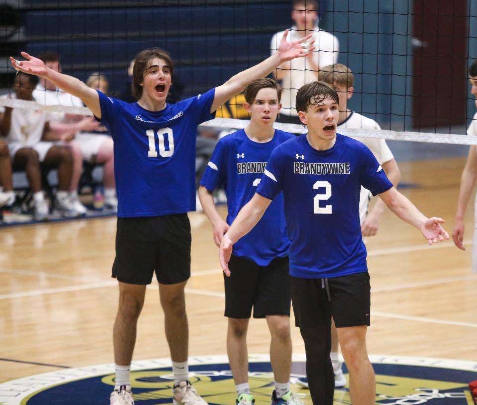 Brandywine's Hans Bober (10), Henry Nelson and Charles Hearn gesture to the visiting crowd for support as the Bulldogs pull off a 3-2 upset in the opening round of the DIAA state high school tournament at Delaware Military Academy, Wednesday, May 15, 2024.