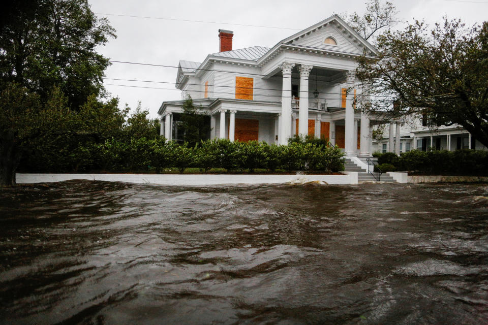 Water from the Neuse River floods houses in New Bern.