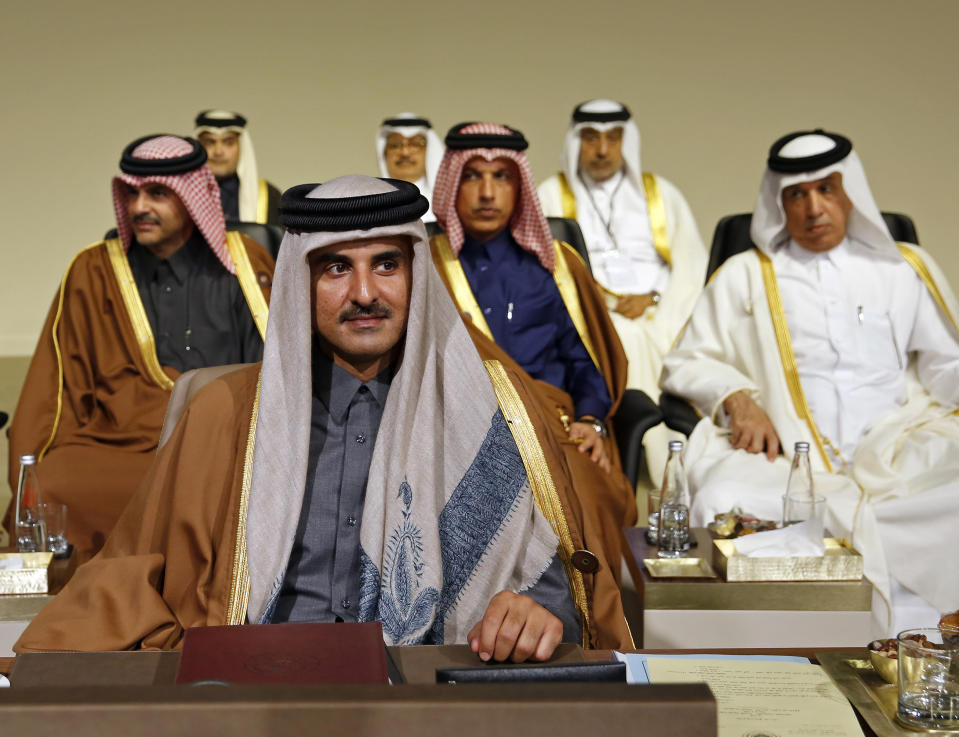 The Emir of Qatar, Sheik Tamim Bin Hamad Al-Thani, attends the Arab Economic and Social Development Summit, in Beirut, Lebanon, Sunday, Jan. 20, 2019. Lebanon used the summit Sunday to call for the start of return of Syrian refugees to safe areas in their war-torn country even before a solution is reached to end the nearly eight-year-old crisis that killed nearly half a million people. (AP Photo/Bilal Hussein)