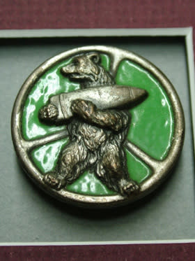 Courtesy of Andy Szawlugo The insignia of the 22nd Artillery Support Company of the 2nd Polish Corps, meant to illustrate Wojtek the bear carrying an ammo shell at the Battle of Monte Cassino.