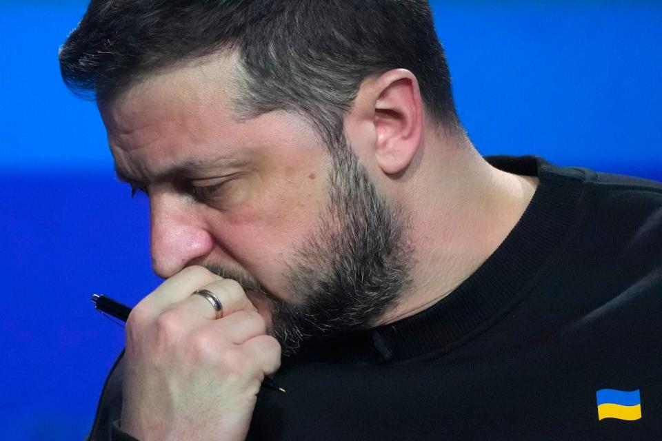 Ukrainian President Volodymyr Zelenskyy reacts during his end-of-the-year news conference in Kyiv, Ukraine on Tuesday, Dec. 19, 2023.