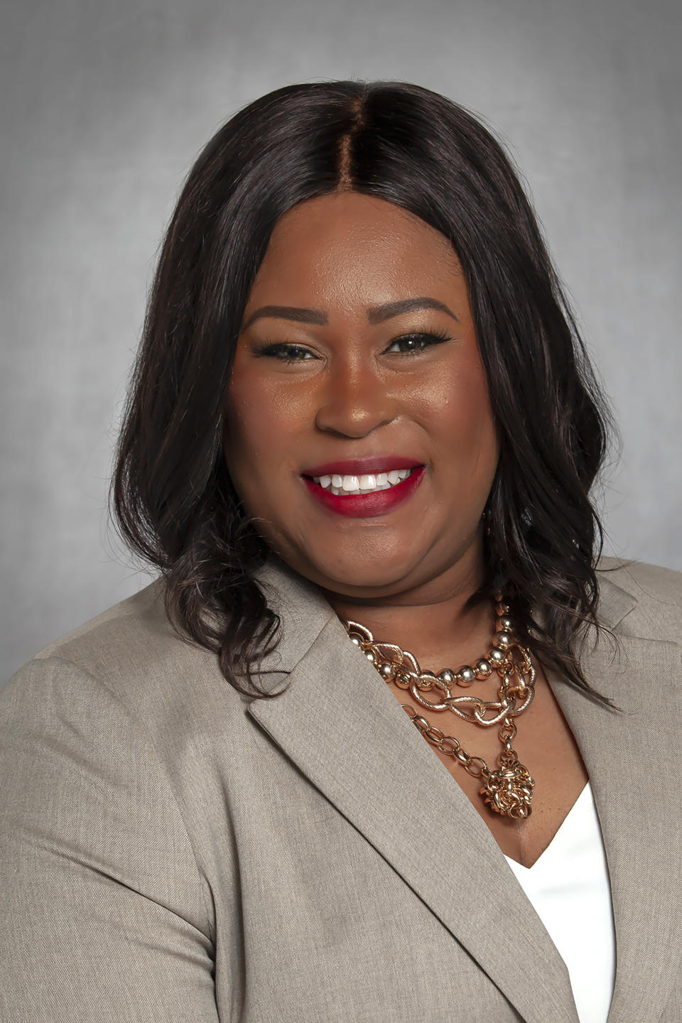 In this photo provided by the Arkansas Secretary of State office, Arkansas Democratic candidate Natalie James, who is running for U.S. Senate in the Democratic primary on Tuesday, May 24, 2022 poses for a photo on Feb. 22, 2022 in Little Rock, Ark. (Danny Harris/Arkansas Secretary of State via AP)