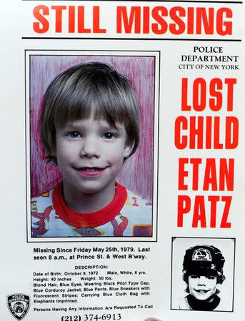 A copy photo of the original missing poster of Etan Patz is shown during a news conference in New York, April 19, 2012. REUTERS/Keith Bedford