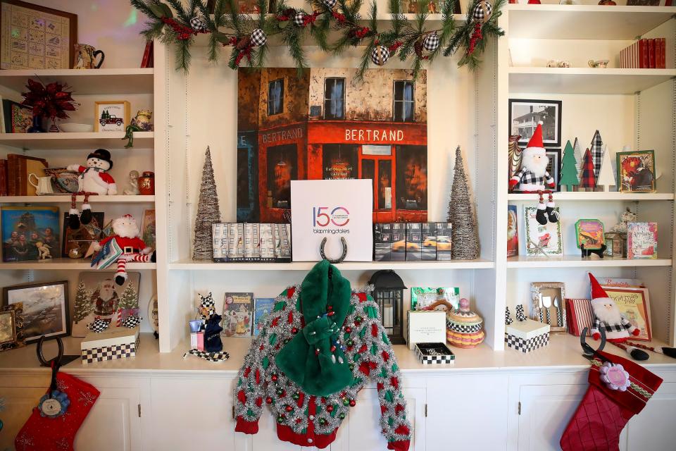 The front room at Chestnut Hall, a historic farmhouse in Kentucky, is full of Christmas decor.