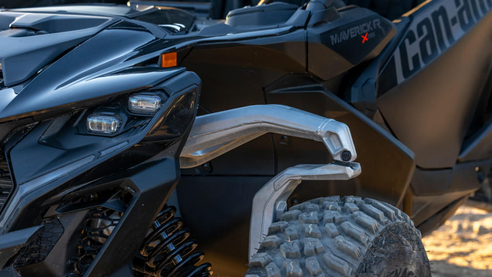 A close-up of the front suspension on a 2024 Can-Am Maverick R.