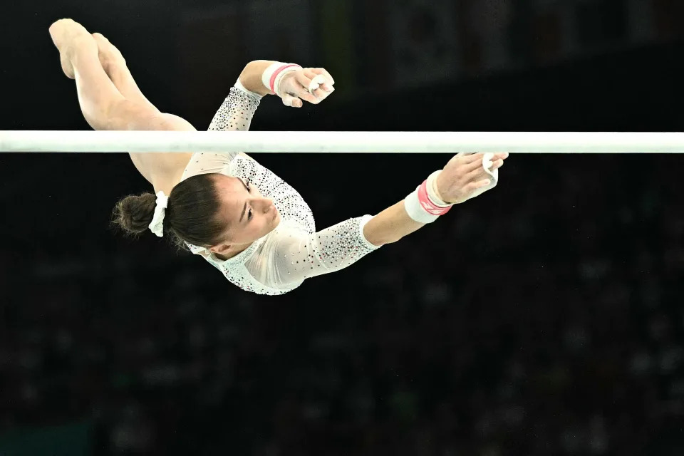 TOPSHOT - Algeria's Kaylia Nemour competes in the artistic gymnastics women's uneven bars final during the Paris 2024 Olympic Games at the Bercy Arena in Paris, on August 4, 2024. (Photo by Lionel BONAVENTURE / AFP) (Photo by LIONEL BONAVENTURE/AFP via Getty Images)