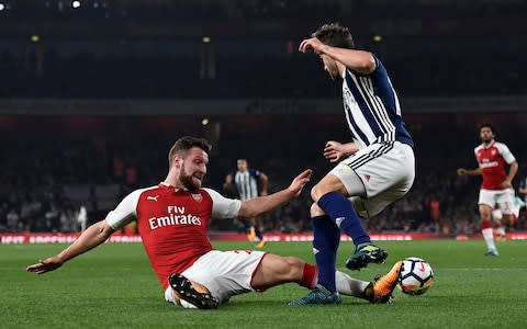 Mustafi challenges West Brom's Jay Rodriguez - Credit: Reuters