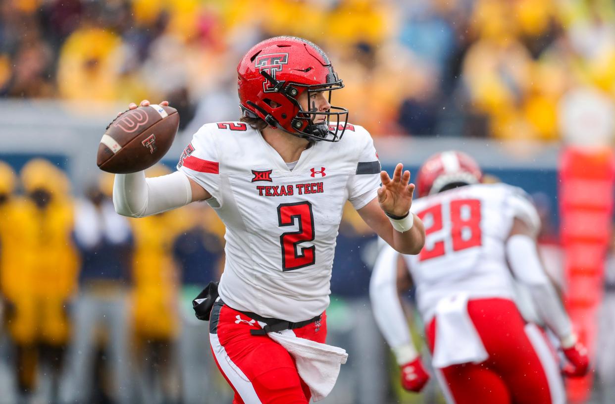 Texas Tech's quarterback Behren Morton (2) throws a pass against West Virginia, Saturday, Sept. 23, 2023, at Milan Puskar Stadium, in Morgantown, West Virginia.