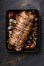 <p>Dinner is served with this Christmas pork belly porchetta - $37.95 per kg; prepped and ready to cook roasting vegetables 1.5kg pack for $24.95 - David Jones</p>