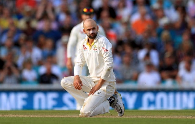 Nathan Lyon reacts as he bowls